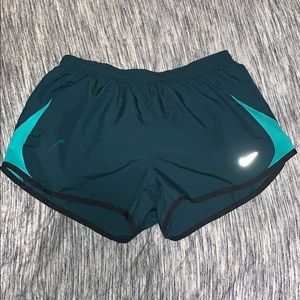 green nike shorts